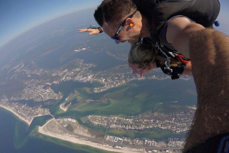 Female enjoying her tandem skydive over the gulf shores